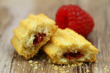 Crunchy cookies with raspberry filling, close up