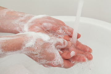 Fototapeta premium Hands rinsing