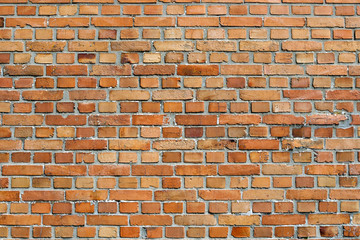 Orangey red brick wall background texture