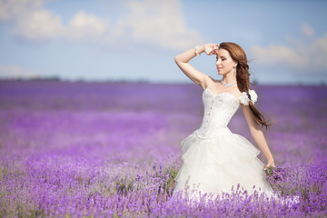 Bride in wedding day in lavender field