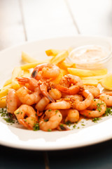 shrimps with french fries potatoes