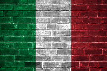 Italy flag on a brick wall