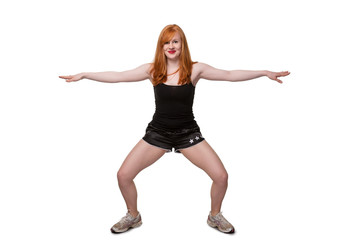 Obraz premium Athletic woman exercising - on white