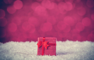 Gift box on snow