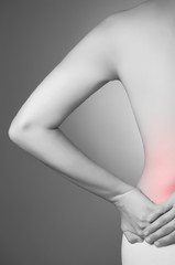 Naklejka premium Woman with lower back pain