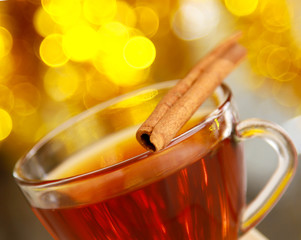 Hot christmas drink with cinnamon sticks