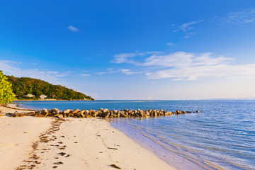 Tropical beach in Seychelles at sunset