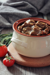 Goulash in a ceramic pot