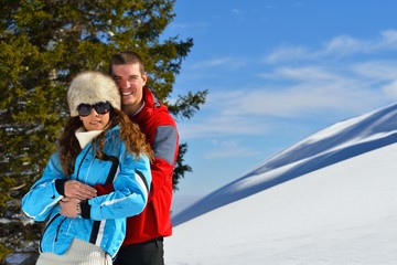 Fototapeta na wymiar young couple on winter vacation
