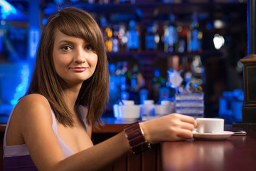 woman with a cup of coffee