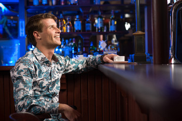 man with a cup of coffee