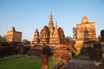 Fototapeta na wymiar Sukhothai historical park. Buddhist temple ruins in Thailand