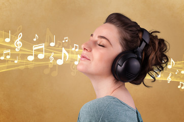 Young woman with headphones listening to music