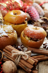 Christmas background of Homemade baked stuffed apples and spices