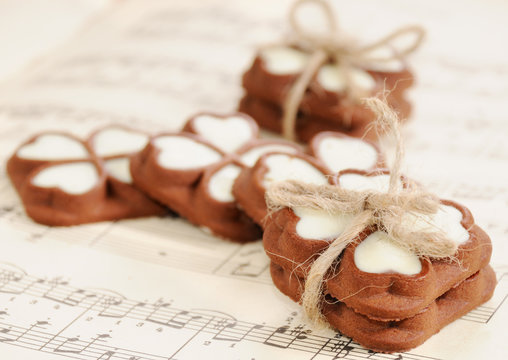 Chocolate cookies for Valentine's day on the musical notation