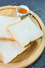 bread and orange drink
