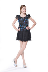 full-length beautiful young casual woman posing in studio