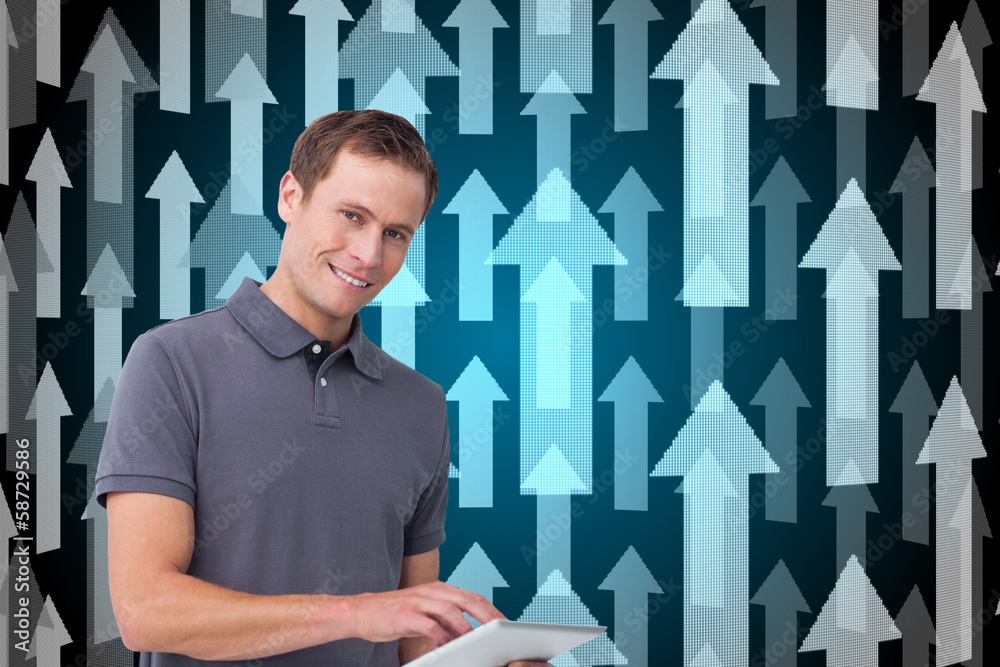 Poster Composite image of smiling young man with tablet computer