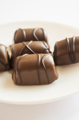 Tasty chocolate bonbon isolated on a white background
