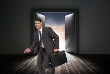 Fototapeta premium Composite image of smiling businessman in a hurry