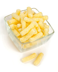 crunchy corn snacks isolated on white