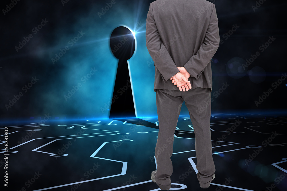 Poster Composite image of rear view of classy businessman posing