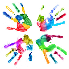 Handprints in different colors on a white