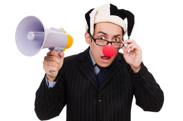 Businessman clown with loudspeaker on white