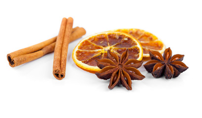 dry orange, cinnamon and Star Anise with copy space, on white ba