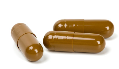 brown capsule pills