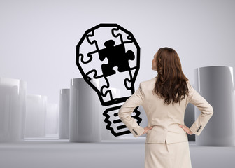 Composite image of businesswoman standing back to camera