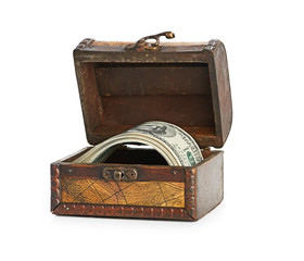 Dollar-bills in the old wooden treasure chest