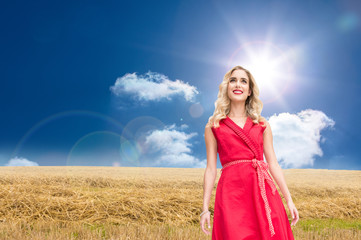 Obraz premium Composite image of smiling blonde walking
