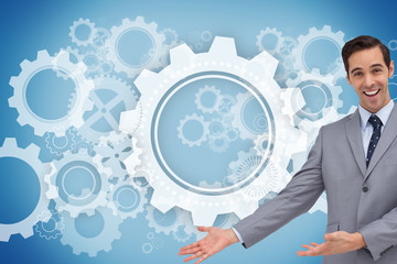 Composite image of happy businessman giving a presentation with