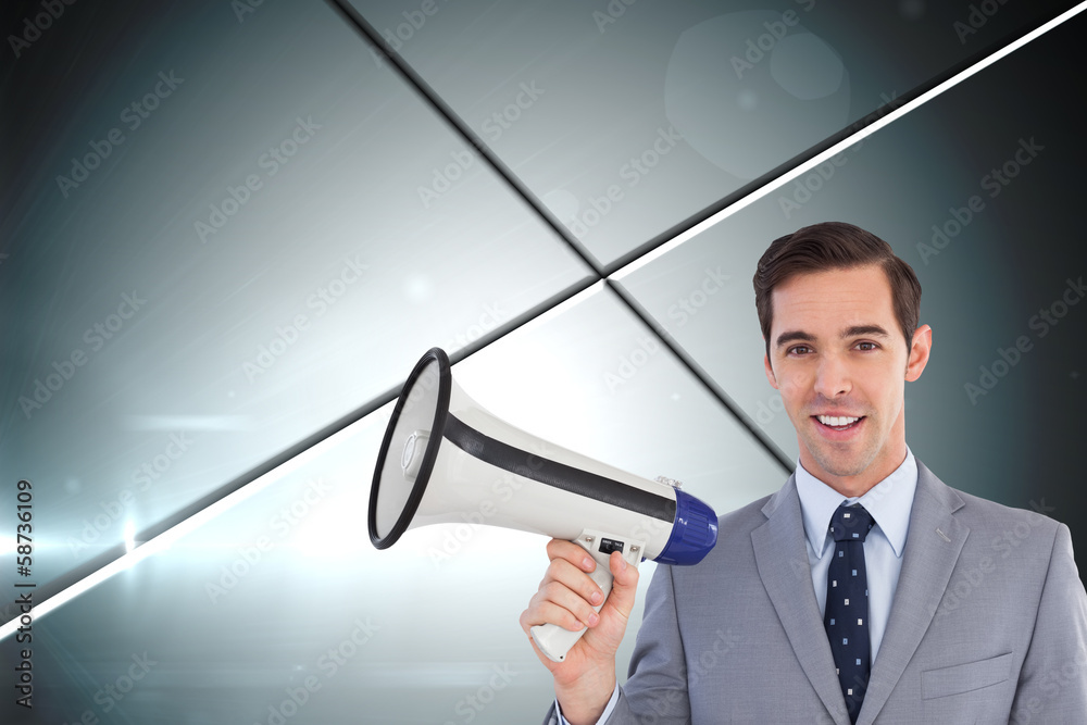 Poster composite image of smiling businessman holding a megaphone