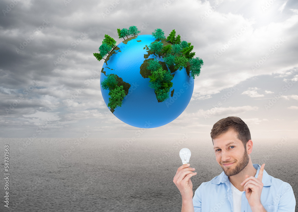 Aufkleber composite image of charming model holding a bulb in right hand