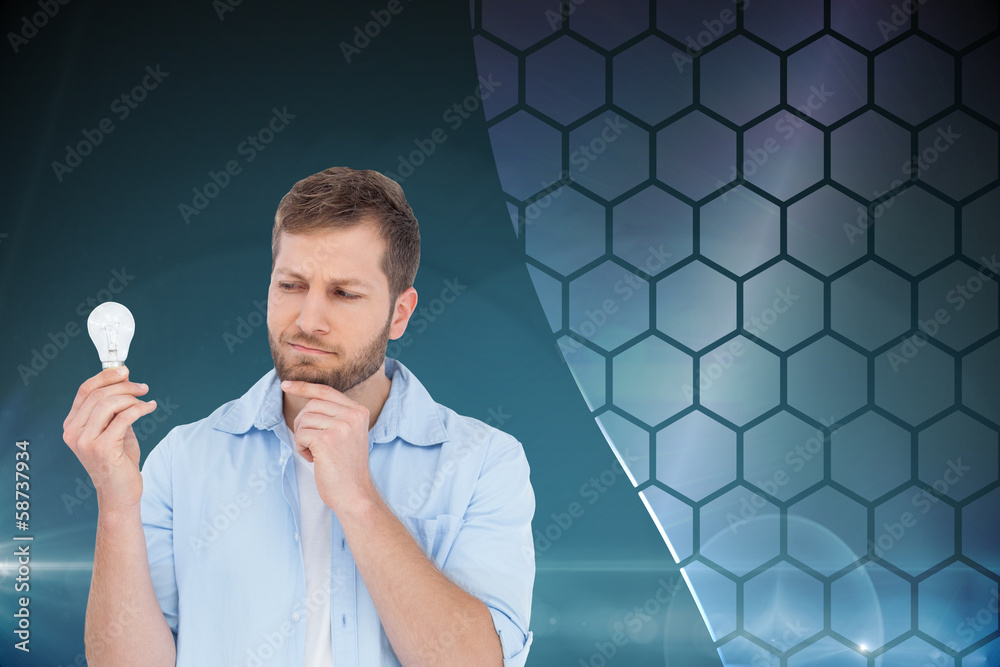 Poster composite image of sceptical model holding a bulb