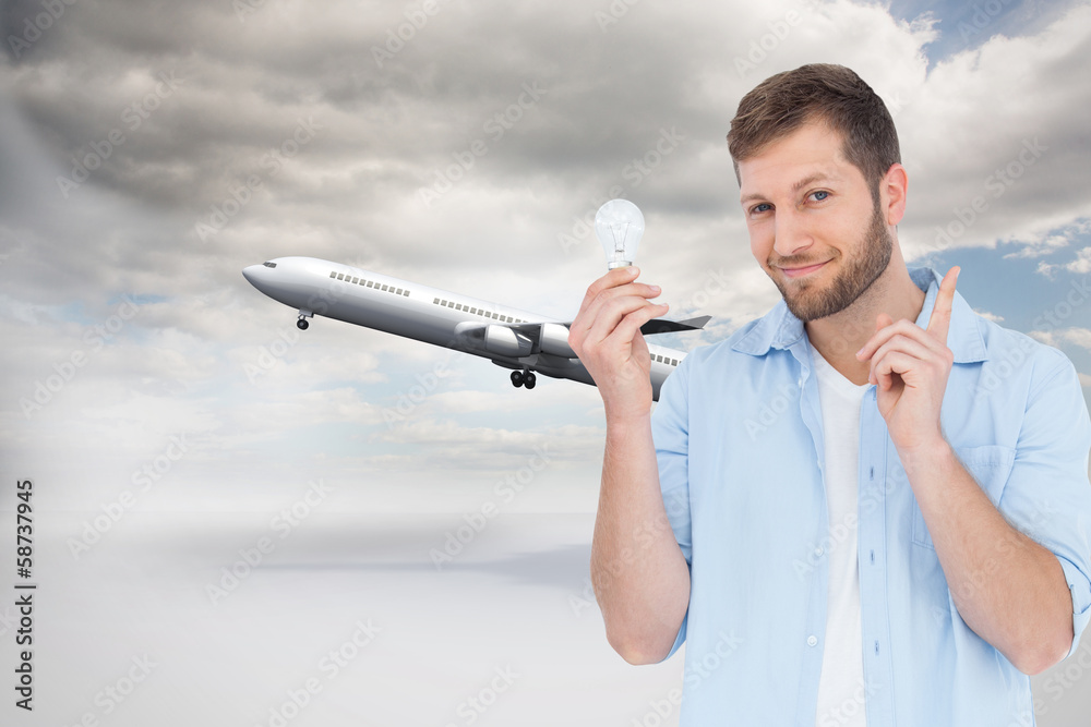 Poster composite image of charming model holding a bulb in right hand