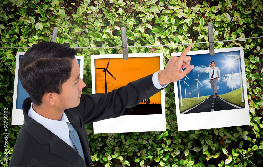 Poster composite image of unsmiling asian businessman pointing