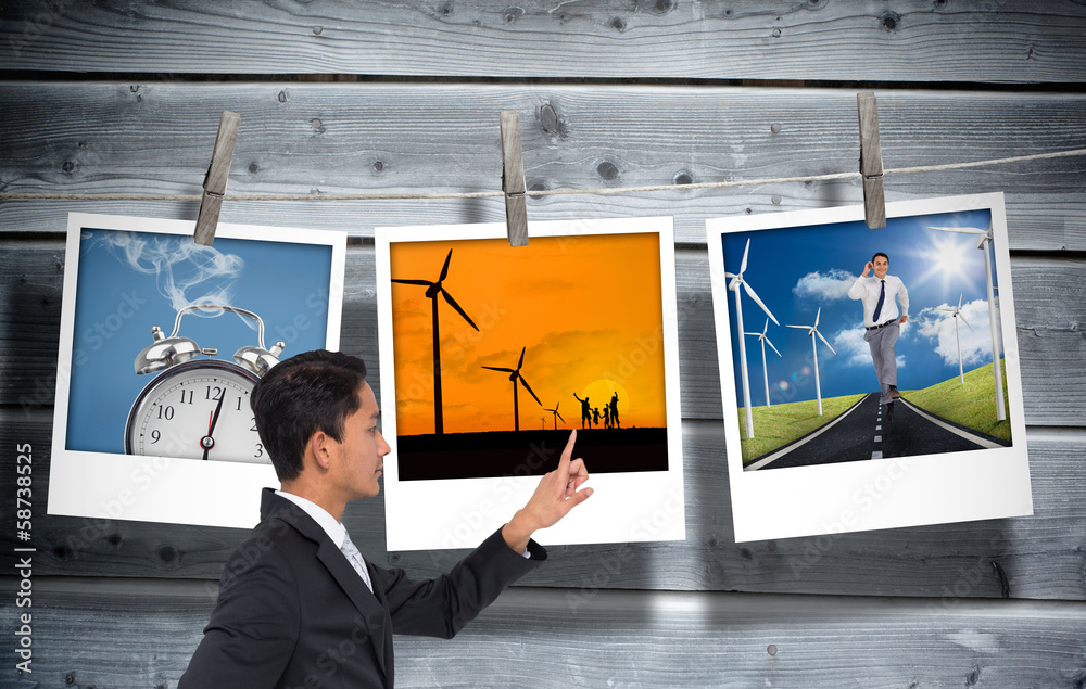 Poster composite image of unsmiling asian businessman pointing