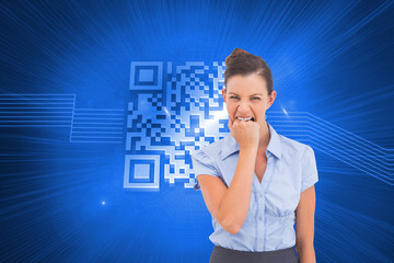 Composite image of furious businesswoman looking at the camera
