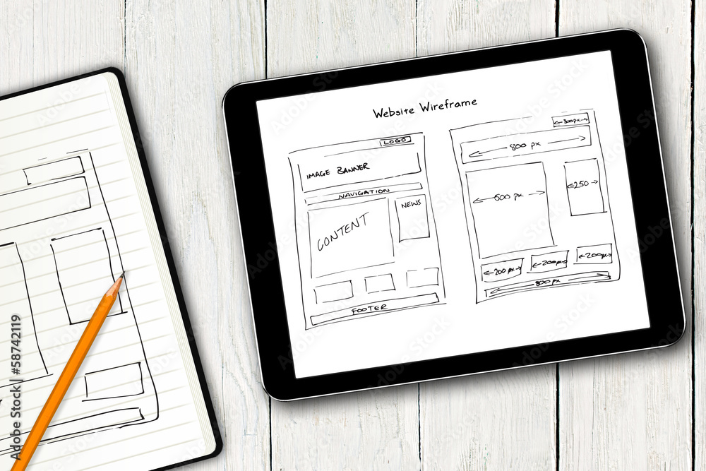 Poster website wireframe sketch on digital tablet screen