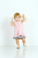 girl with angel wings on a white background
