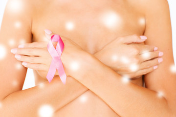 naked woman with breast cancer awareness ribbon