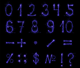 Fireworks numbers and symbols on black background