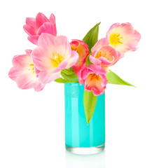 Pink tulips in bright vase, isolated on white