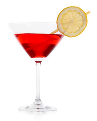 Red cocktail in martini glass isolated on white