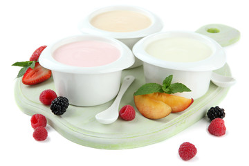 Delicious yogurt with fruit and  berries isolated on white