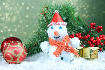 Beautiful snowman and Christmas decor, on bright background