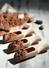 Cocoa powder on wooden table
